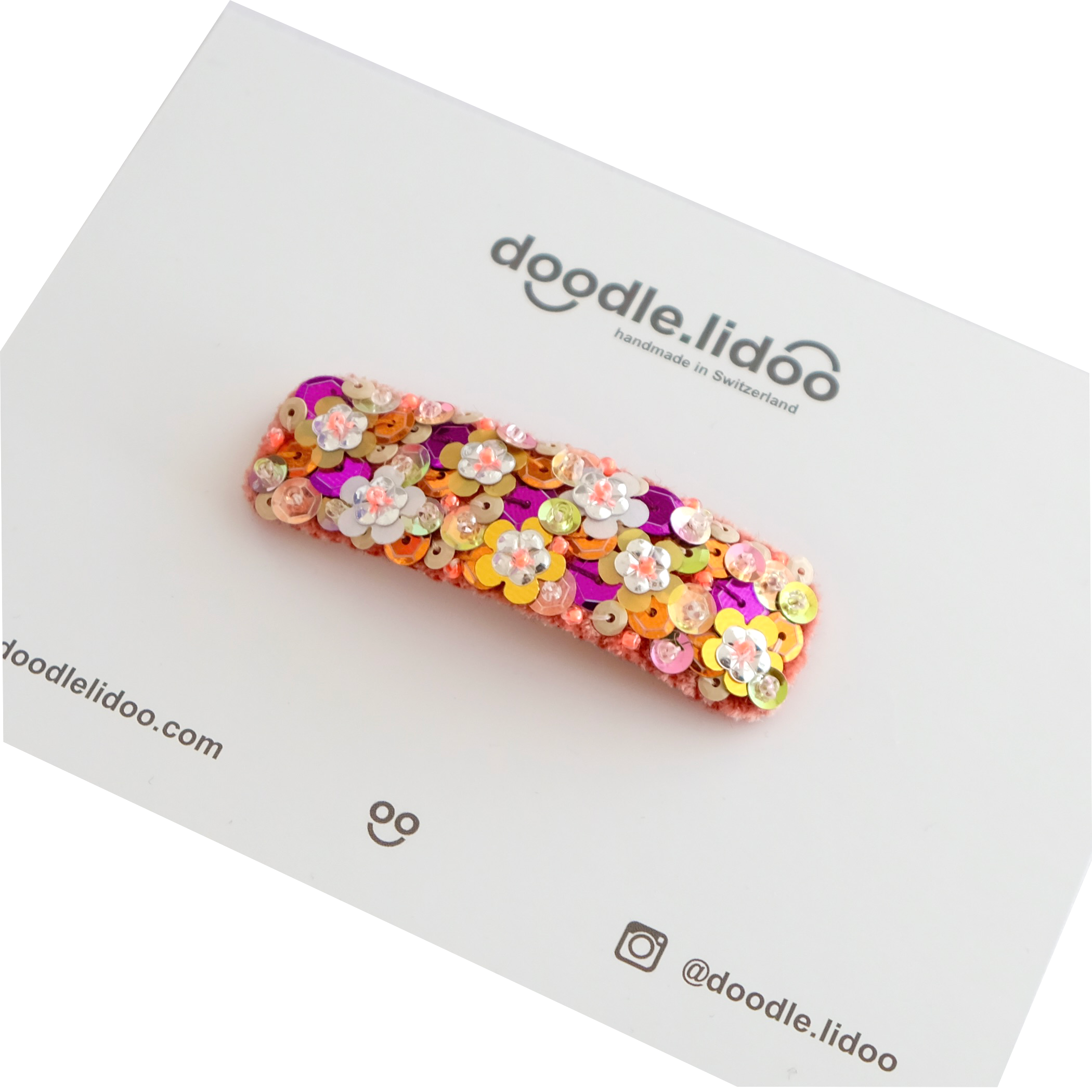 Ginger hair clip in rectangular shape made from silk velvet and embellished with sequins.