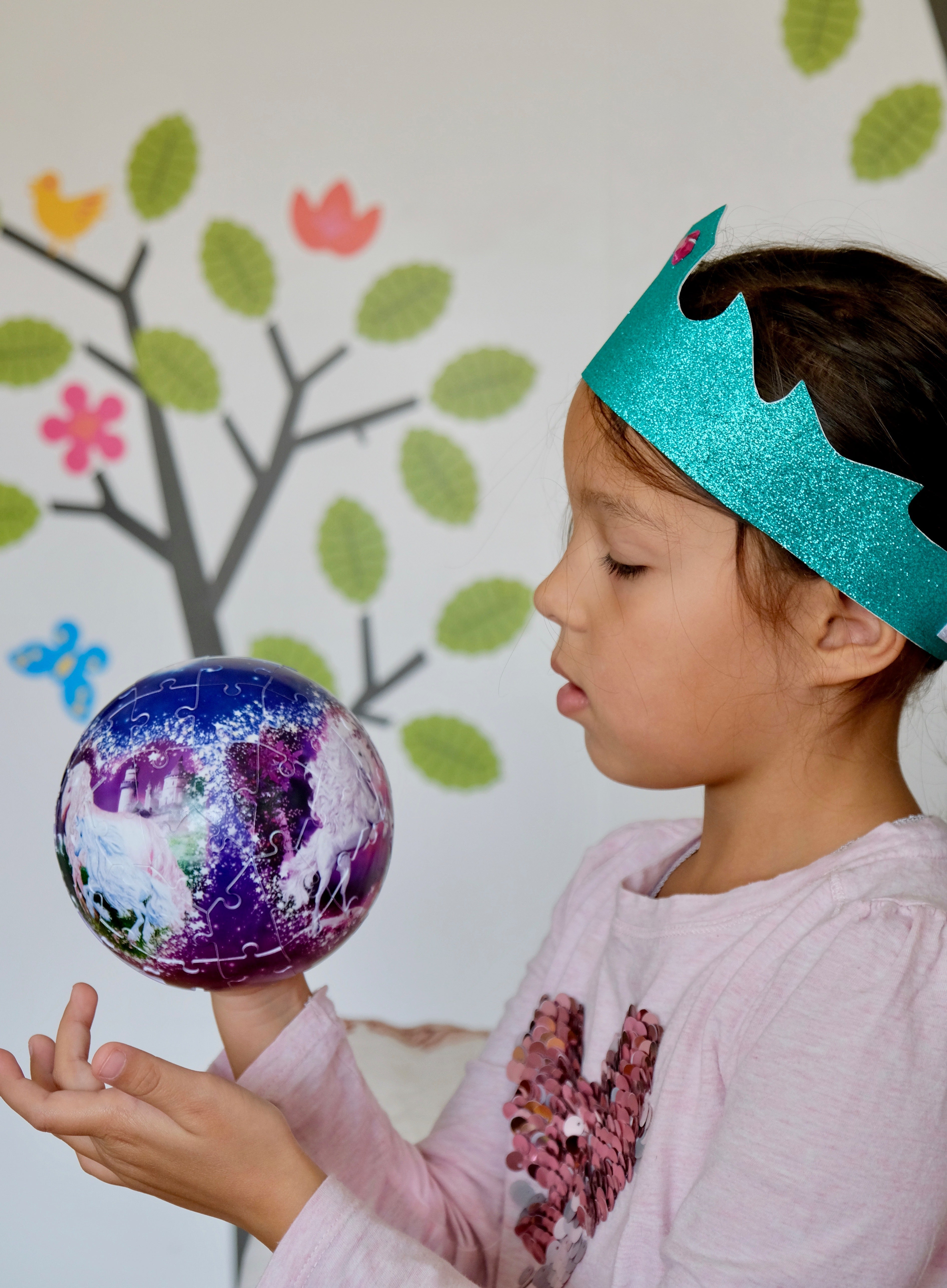 doodlelidoo pretend play crown worn by a toddler at play.