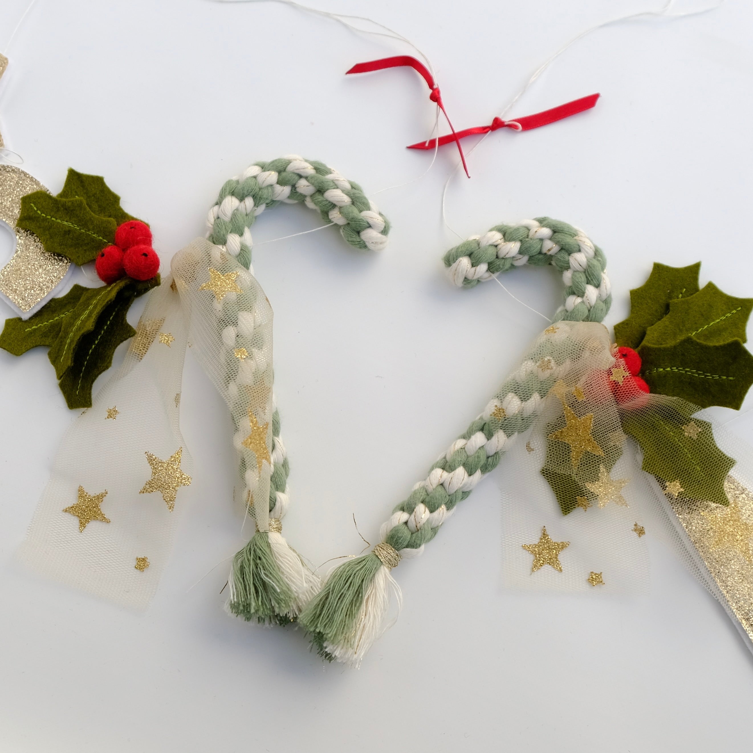 Candy cane detail on Christmas garland.