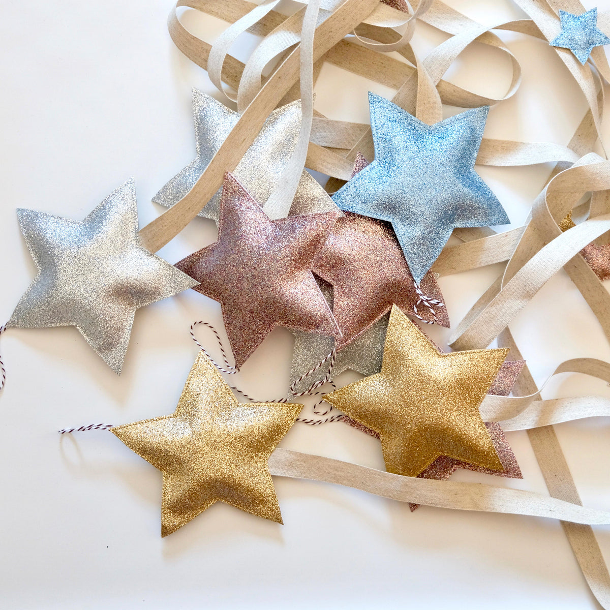 Our stylish star shaped hair clip hangers are available in silver, gold, pink or blue glitter fabric.