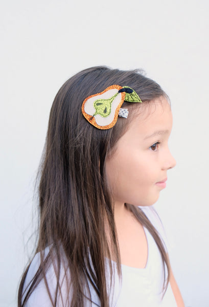 Girl with pear hair clip.