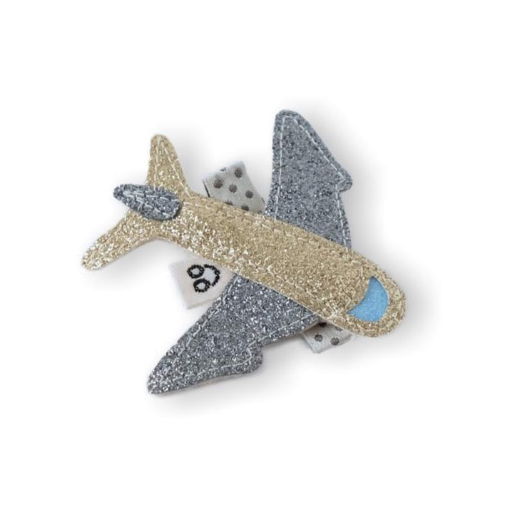 This handcrafted hair clip in the shape of an airplane will spruce up any hair style and give it a touch of glamour.
