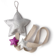 Silver star hair clip holder that can be wall or door hung. The star is made from high quality glitter cotton fabric. 
