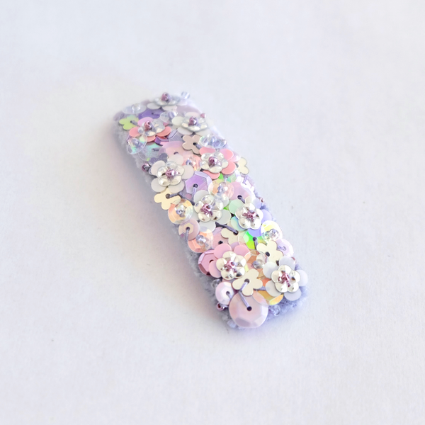 Lavender color hair clip made from lush velvet and embellished with sparkly sequin.