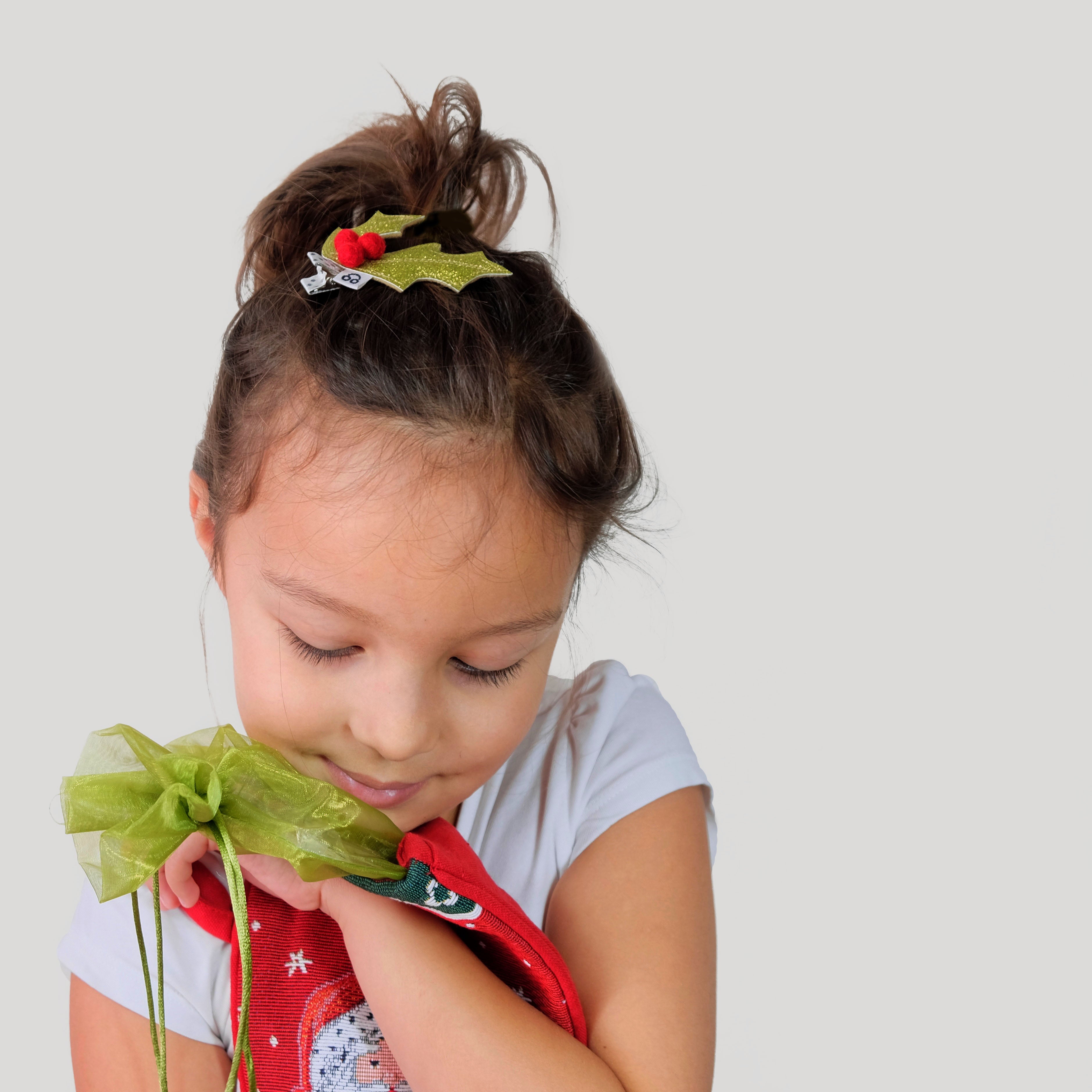 Model with holly hair clip.