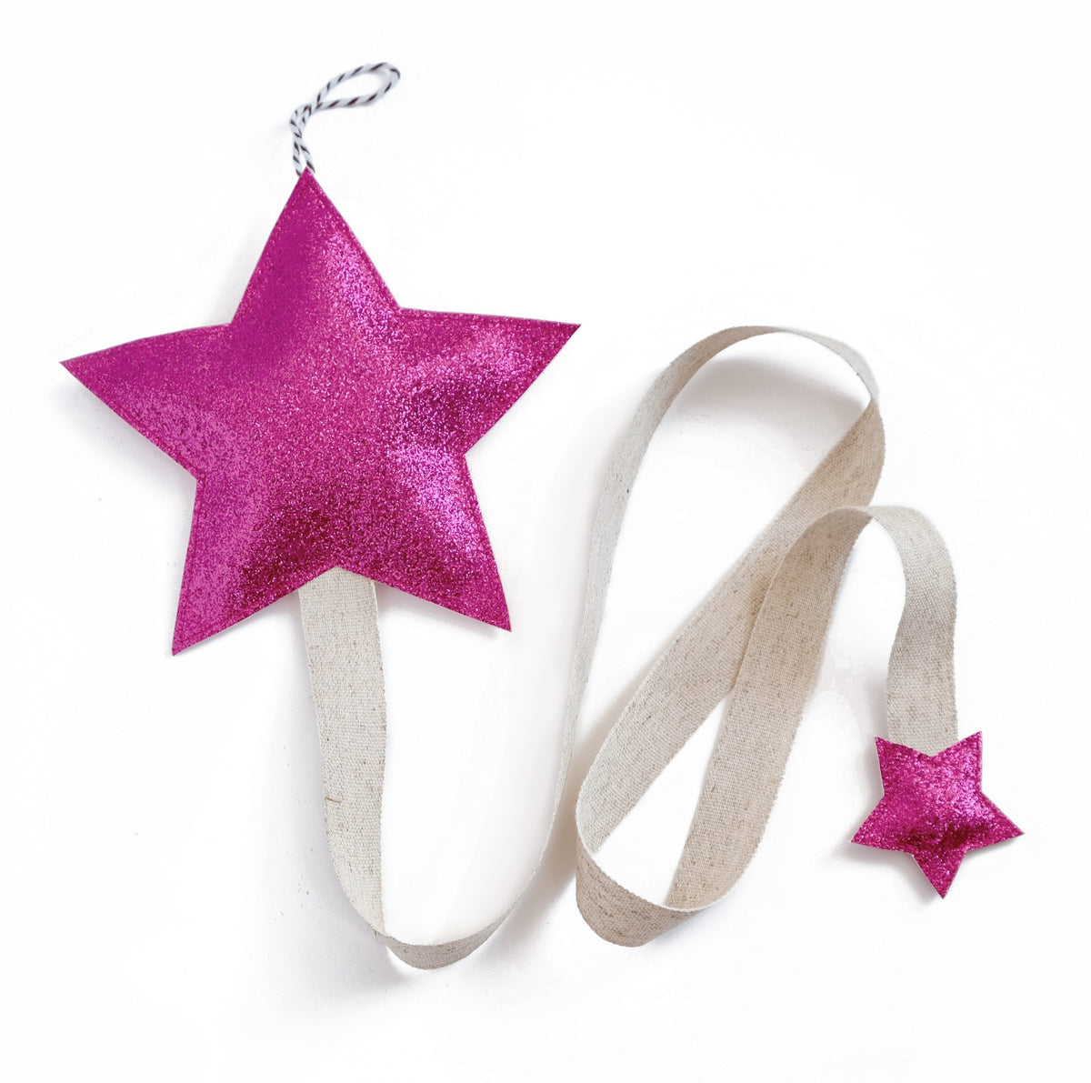 Stylish star shaped hair clip holder that can be mounted onto a wall or door.