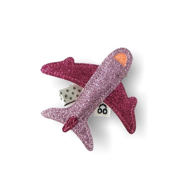 Fun pink  hair clip for girls in the shape of an airplane.