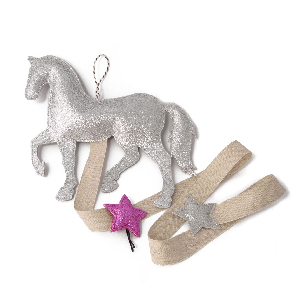Silver pony hair clip organizer that can be hung onto the wall or door.  It's the perfect gift for your little pone lover and budding equestrian.