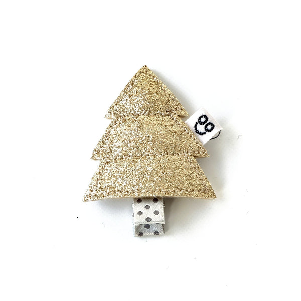 Pine tree hair clip in gold.