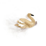 Striking gold swan hair clip with white feathers.  A hair accessory for a special occasion.
